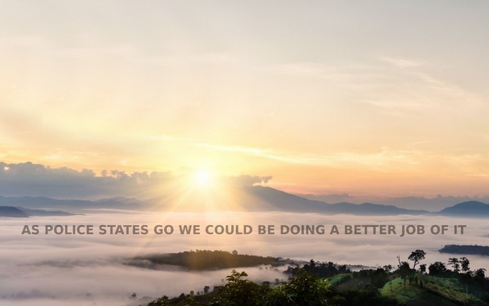 Sunrise over misty mountains with text overlay