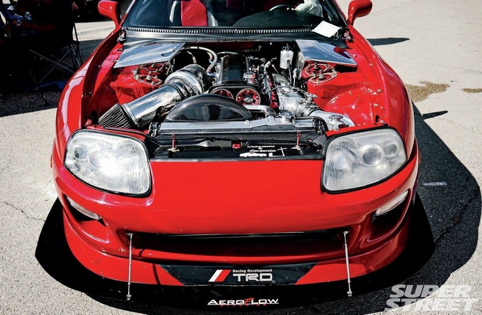 Red Toyota Supra with Exposed Engine Performance