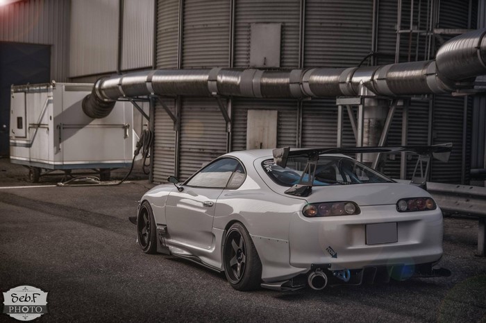 White Toyota Supra with large spoiler
