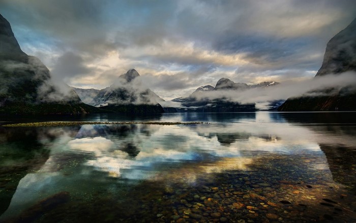 Milford Sound Fjord with Mountains and Clouds