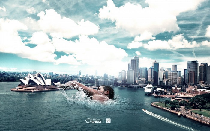 Man swimming in Sydney Harbour with Opera House and city skyline