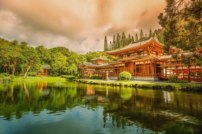 Byodo-In Temple reflection in a pond with trees