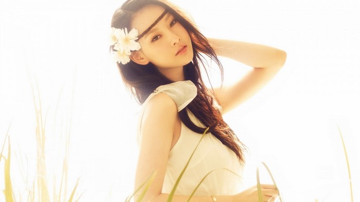 Brunette Woman with Flower in Hair