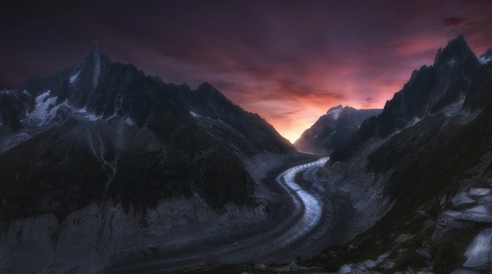 Glacier valley in the Alps at sunrise