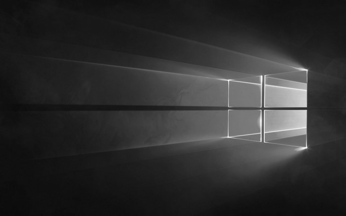 Windows 10 logo with light rays and reflection