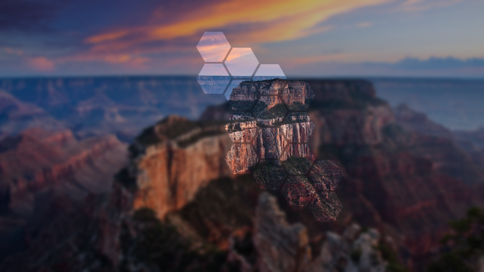 Grand Canyon landscape at sunset with hexagonal overlay