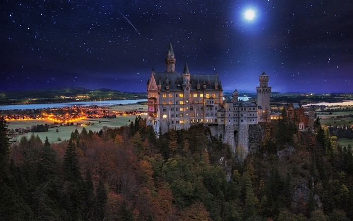 Neuschwanstein Castle at night with starry sky