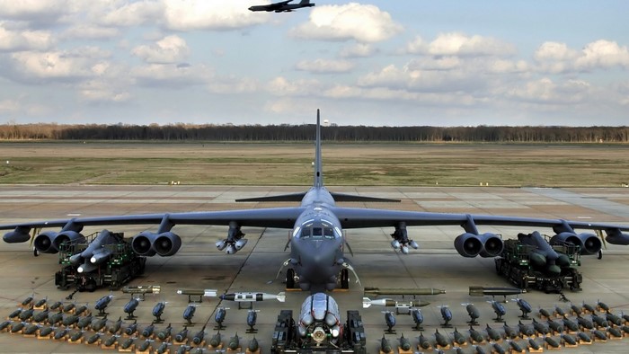 Boeing B-52 Stratofortress with bombs and aircraft