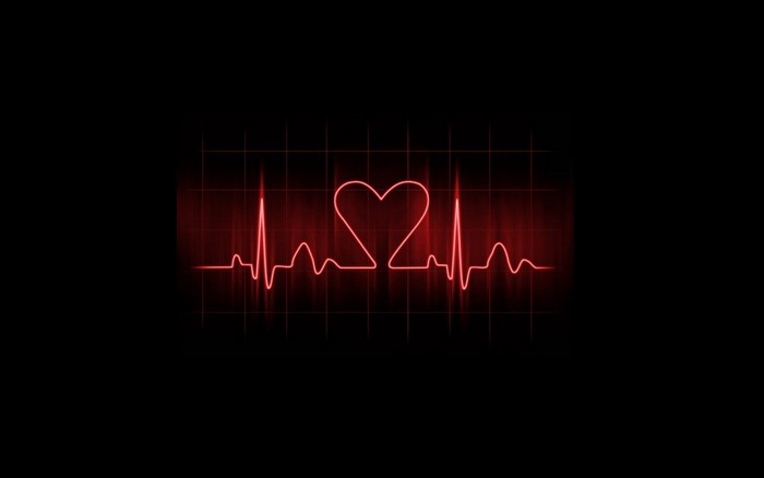 Red Heartbeat EKG Line on Black Background