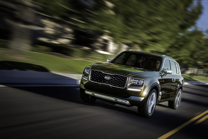 Kia Telluride concept SUV driving on a road