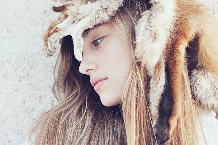 Woman wearing a fur headdress