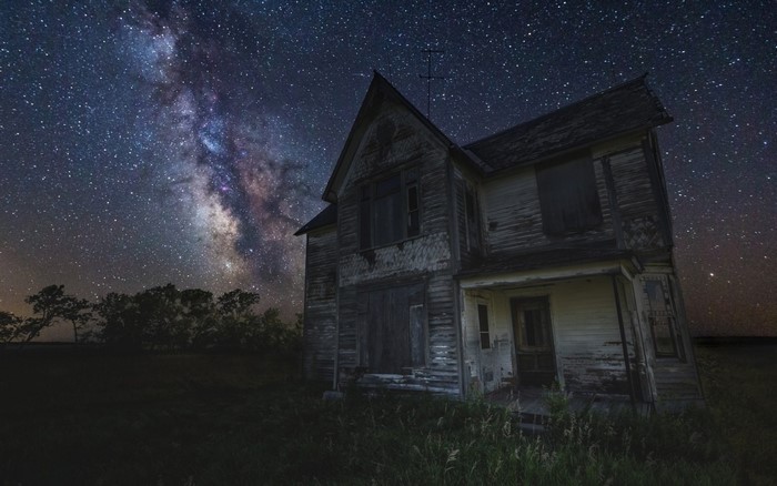 Abandoned house under the Milky Way