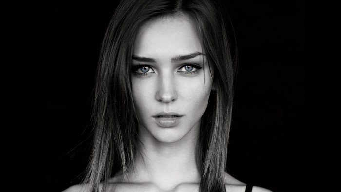 Monochrome Portrait of a Woman with Piercing Eyes