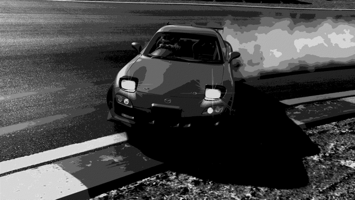 Mazda RX-7 drifting on a race track