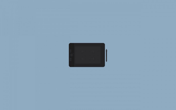 Minimalist graphic tablet and stylus on a blue background