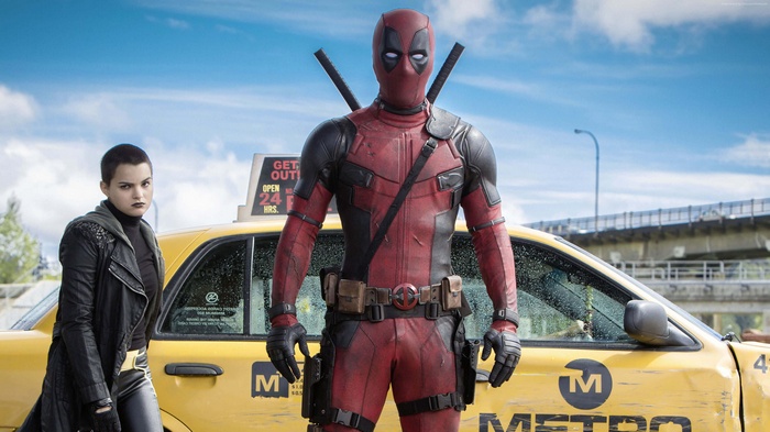 Deadpool and Domino with a Metro Taxi
