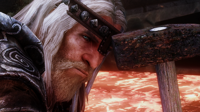 Close up of a man with a hammer in The Elder Scrolls V Skyrim