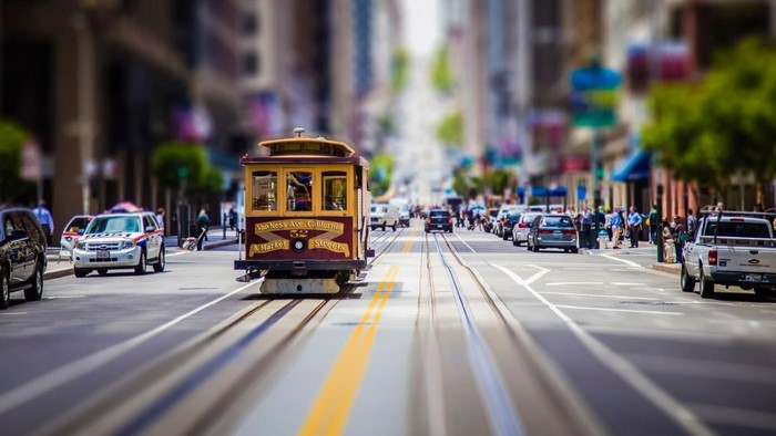 Cable car on a street in San Francisco with traffic