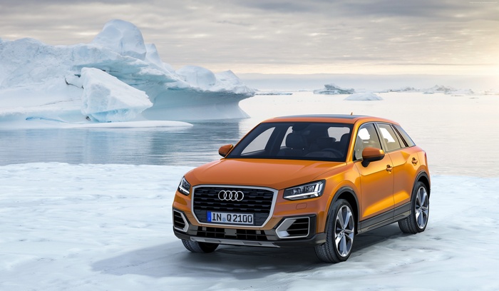 Orange Audi Q2 TFSI quattro on ice