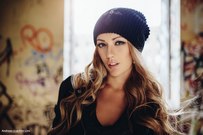 Woman wearing a black beanie and jacket