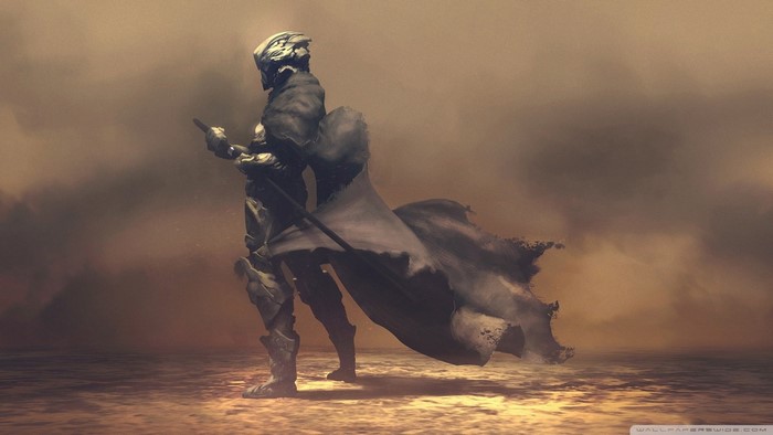 Person in armor with a cape and sword