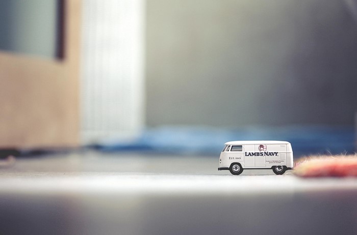 White toy van with "LAMBS NAVY" logo