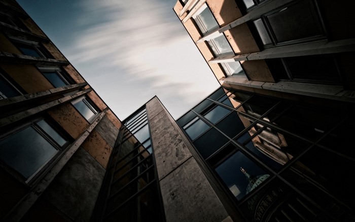 Low angle view of modern buildings with reflections