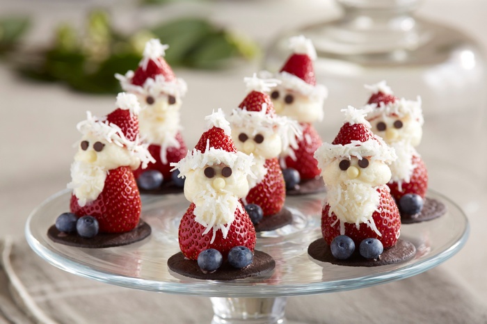 Santa Claus fruit snacks on a cake stand
