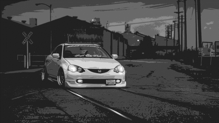 White Acura RSX on train tracks