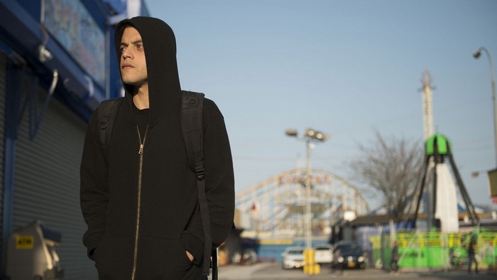 Elliot Alderson from Mr. Robot in an amusement park