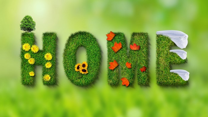 The word HOME made of grass and natural elements