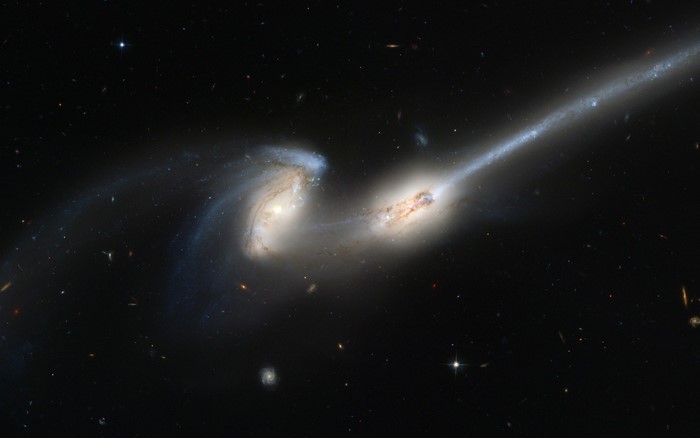 The Mice Galaxies interacting in space