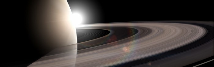 Saturn and its rings with the sun