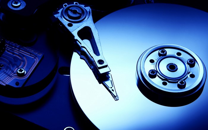 Close-up of a hard drive platter and read/write head