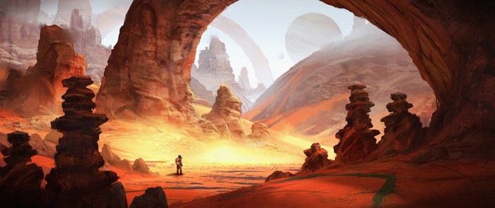 Astronaut in a desolate alien landscape with rock formations and rings in the sky