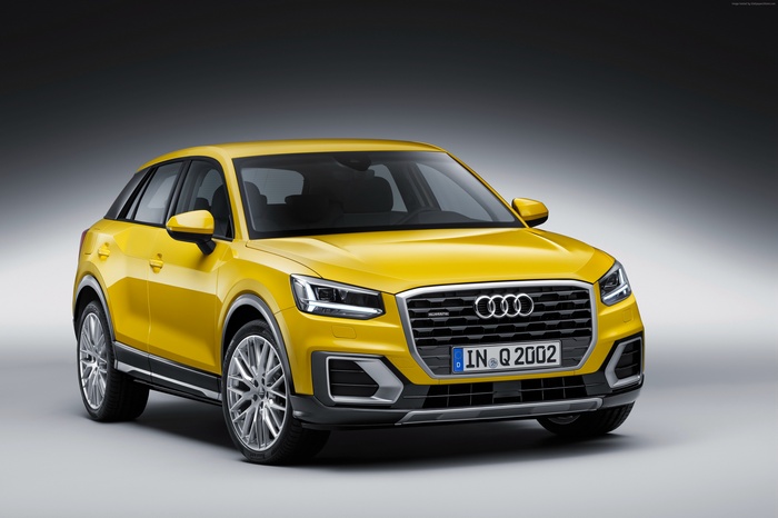 Yellow Audi Q2 TDI quattro crossover