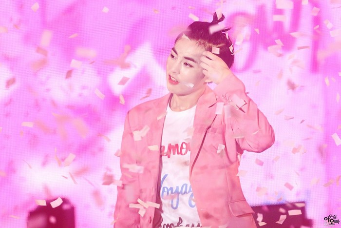 Man in pink suit with confetti