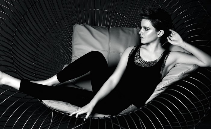 Emma Watson sitting in a modern chair