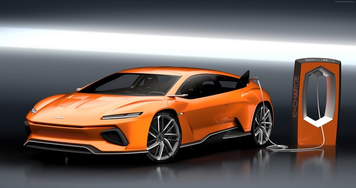 Orange electric shooting brake GT Zero charging