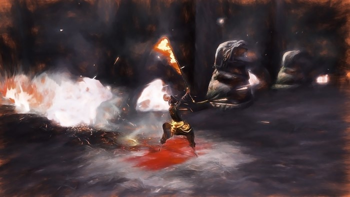 Character with flaming weapon in a dark cave