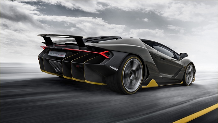 Lamborghini Centenario driving on a road