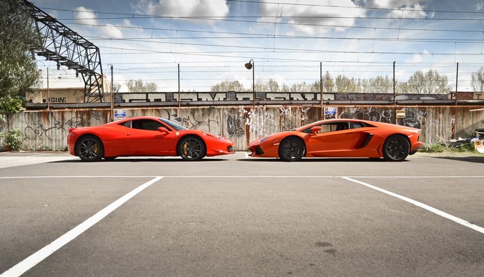 Ferrari and Lamborghini Aventador parked side-by-side