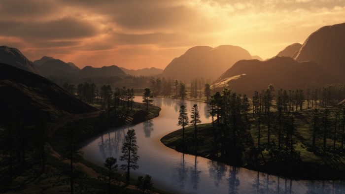 River flowing through mountains at sunset