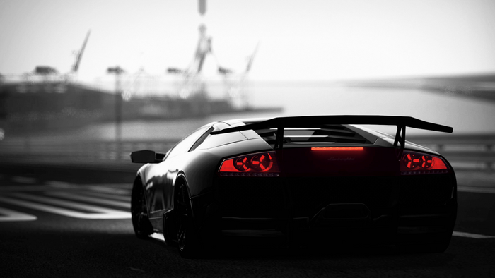 Black Lamborghini Murcielago with red taillights