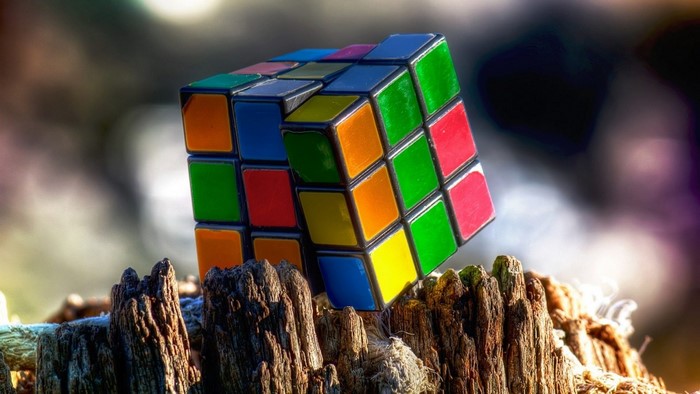 Rubik's Cube on a weathered wooden surface