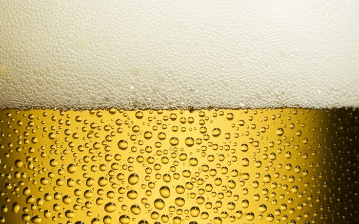 Close up of beer with foam and bubbles