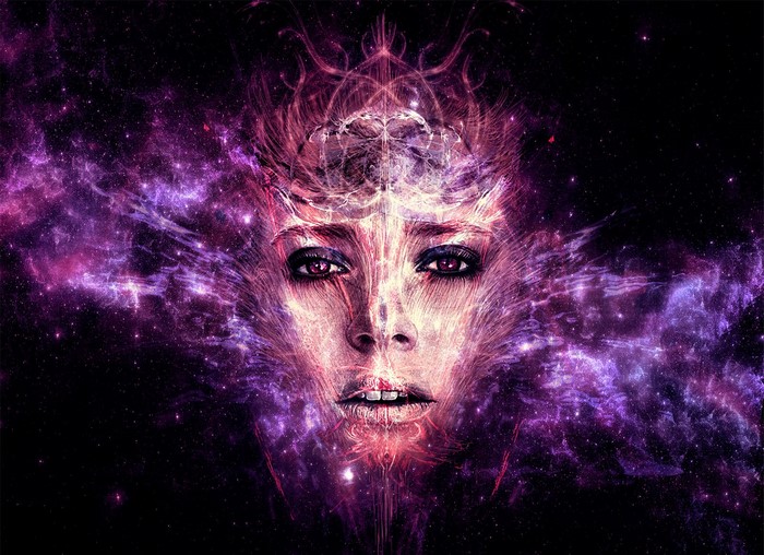 Woman's face emerging from cosmic nebula