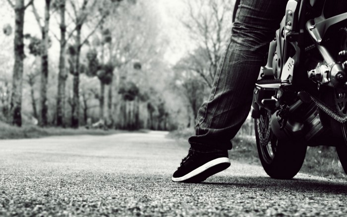 Person on a motorcycle on a road