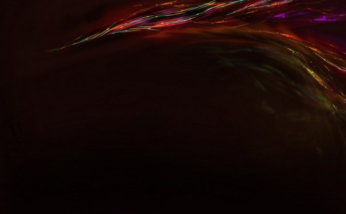 Abstract colorful light streaks on dark background