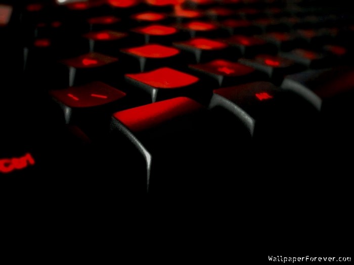 Close-up of a red and black computer keyboard